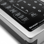 A macro photo of the SHARP non-traditional control pad.