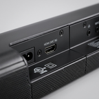 Macro view of SHARP HT-SBW192 soundbar rear panel, showing HDMI ARC port and key safety labels.