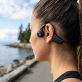 Runner wearing Sharp HP-BC55 Bone Conduction Bluetooth Headphones during outdoor exercise